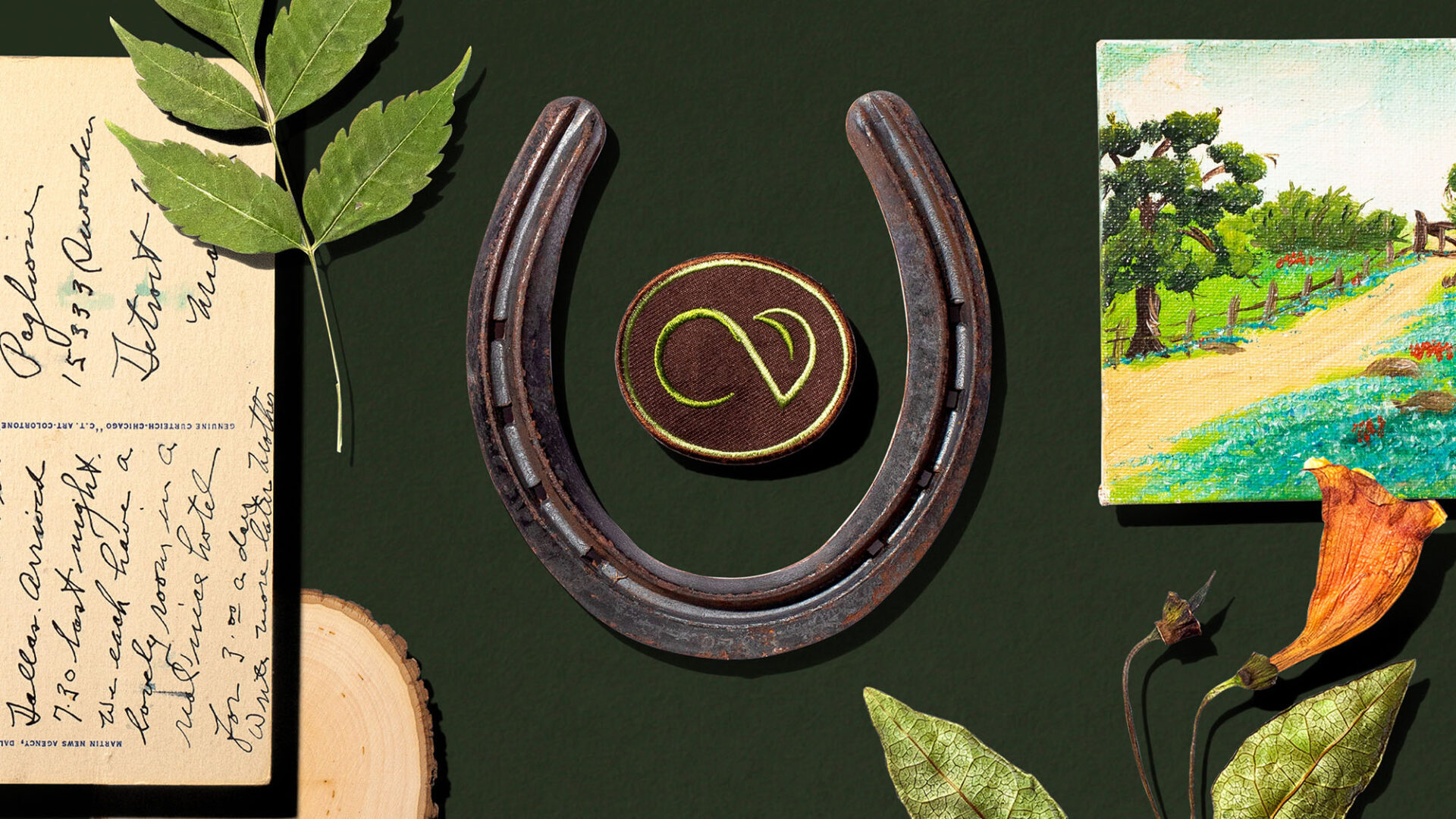 horseshoe with CV logo and collage